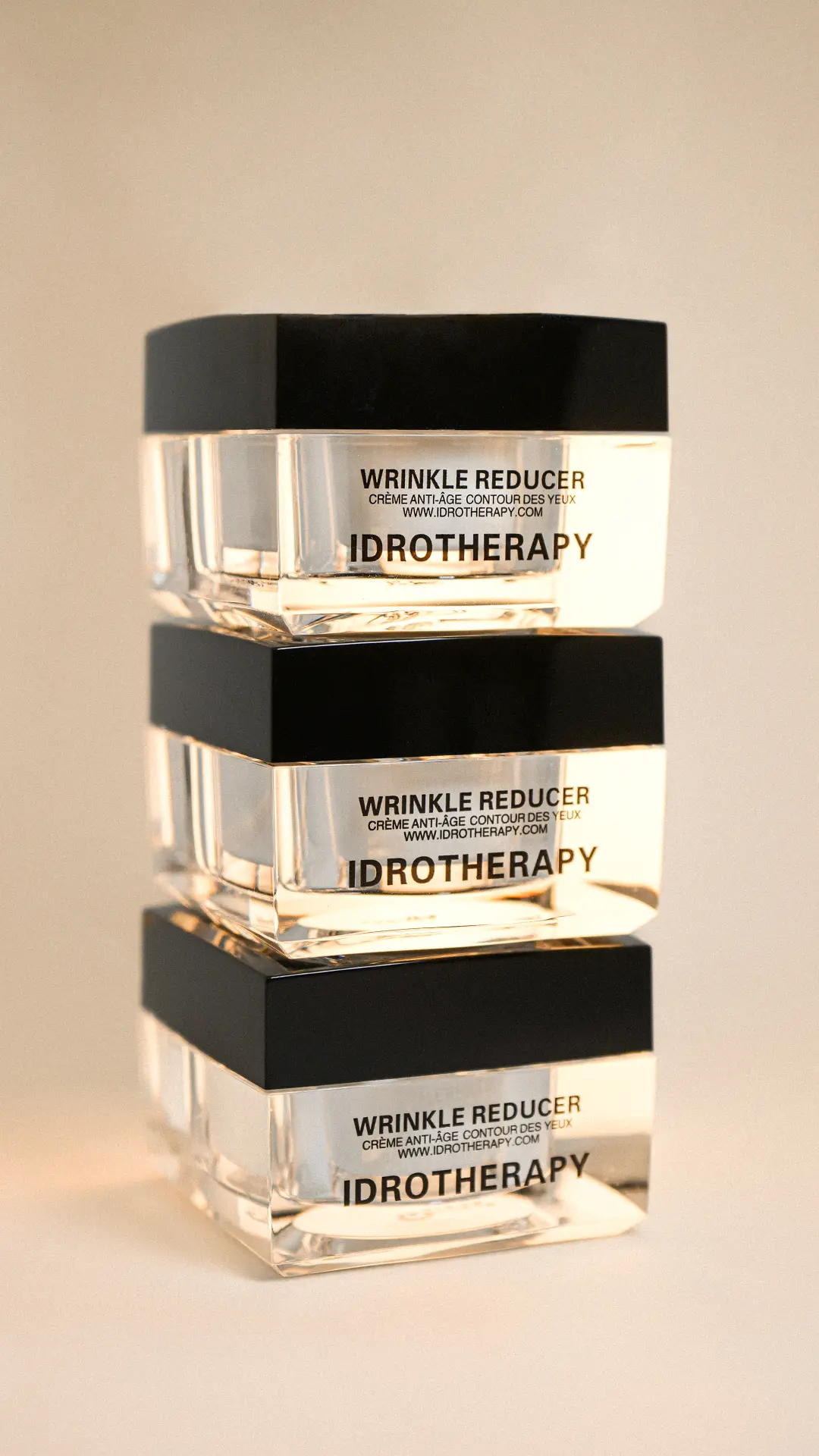 Three jars of Idrotherapy Wrinkle Reducer stacked together